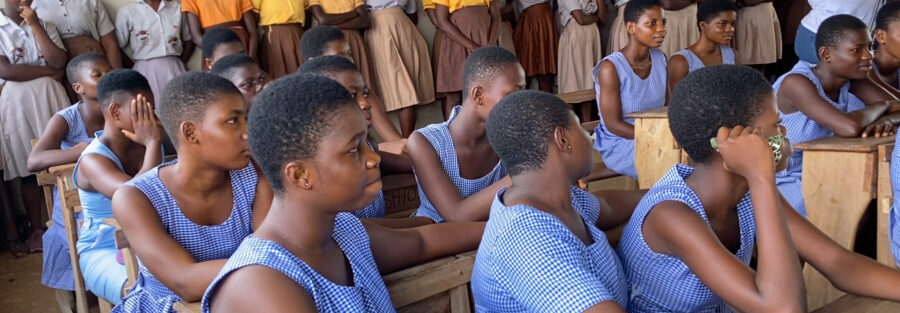 Students in Mfanteman listening to education on breast cancer